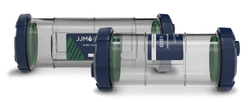 Acidic condensate from heating system treated by JJM condensate neutralizer device.